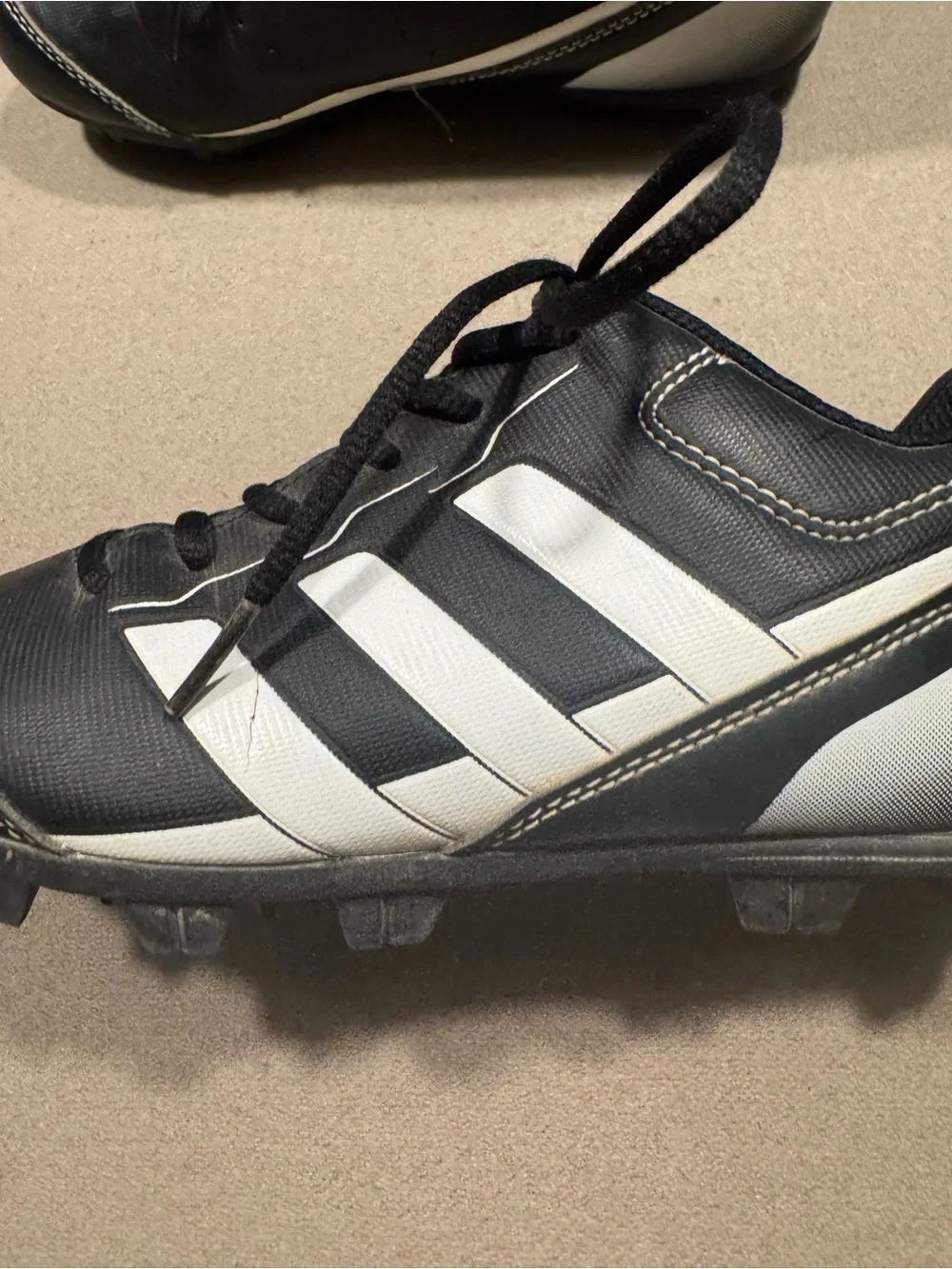 adidas boys  Black Athletic Cleats with White Stripes size 2